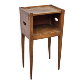 Antique wooden bedside table with openwork side handles, late 19th century