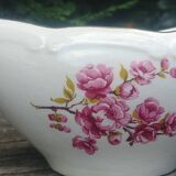 Porcelain saucière of the Gien earthenware factory model "peach blossoms"