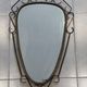 Mid-century modern iron mirror, brutalist, vintage organic, thick sixties.