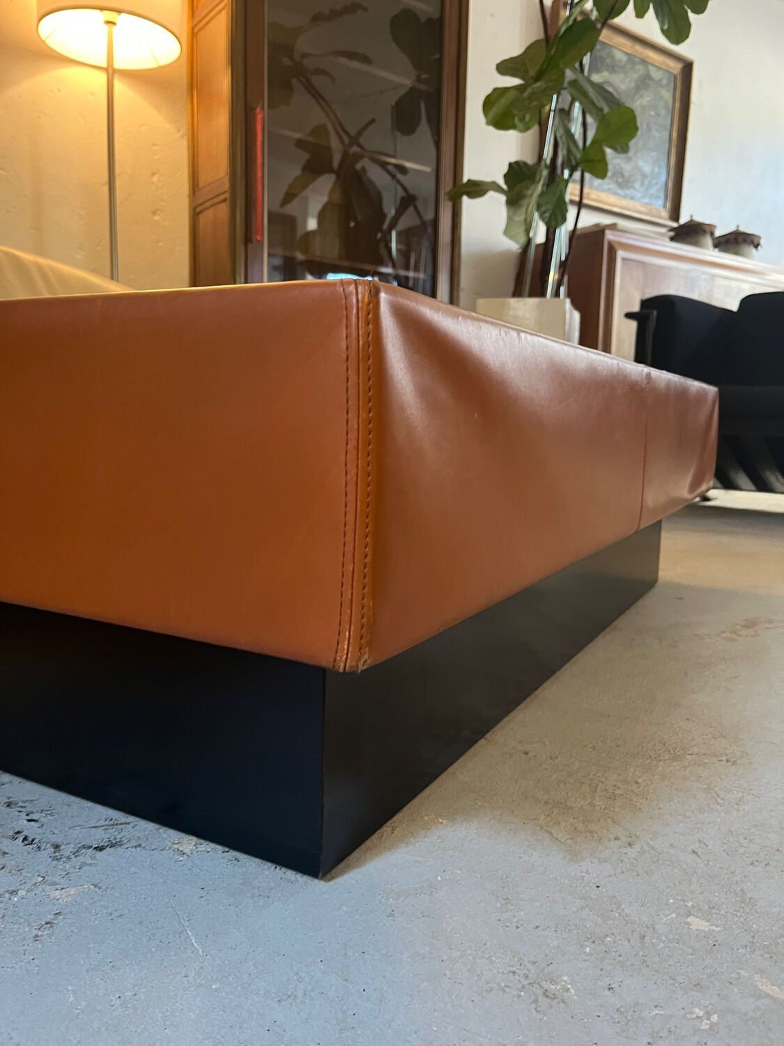 Caramel leather and black glass coffee table