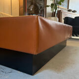 Caramel leather and black glass coffee table