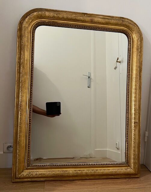 Old mirror Louis-Philippe in gilded wood