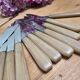 12 vintage knives in a box + 1 butter knife