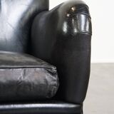Luxurious and comfortable sheepskin armchair in a unique, stately black color