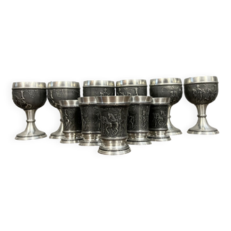 Series of vintage chalices and glasses medieval style in pewter