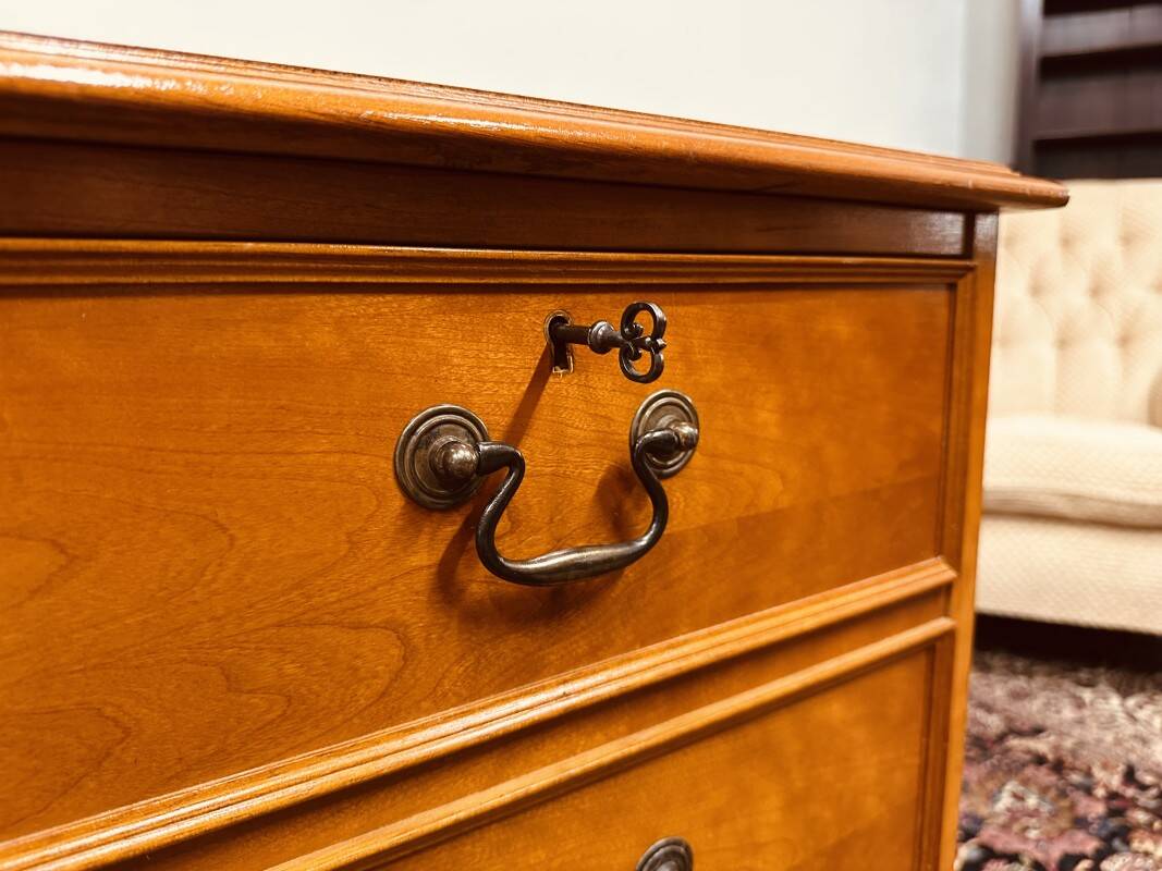 Classic English Chest of Drawers with leather inlay