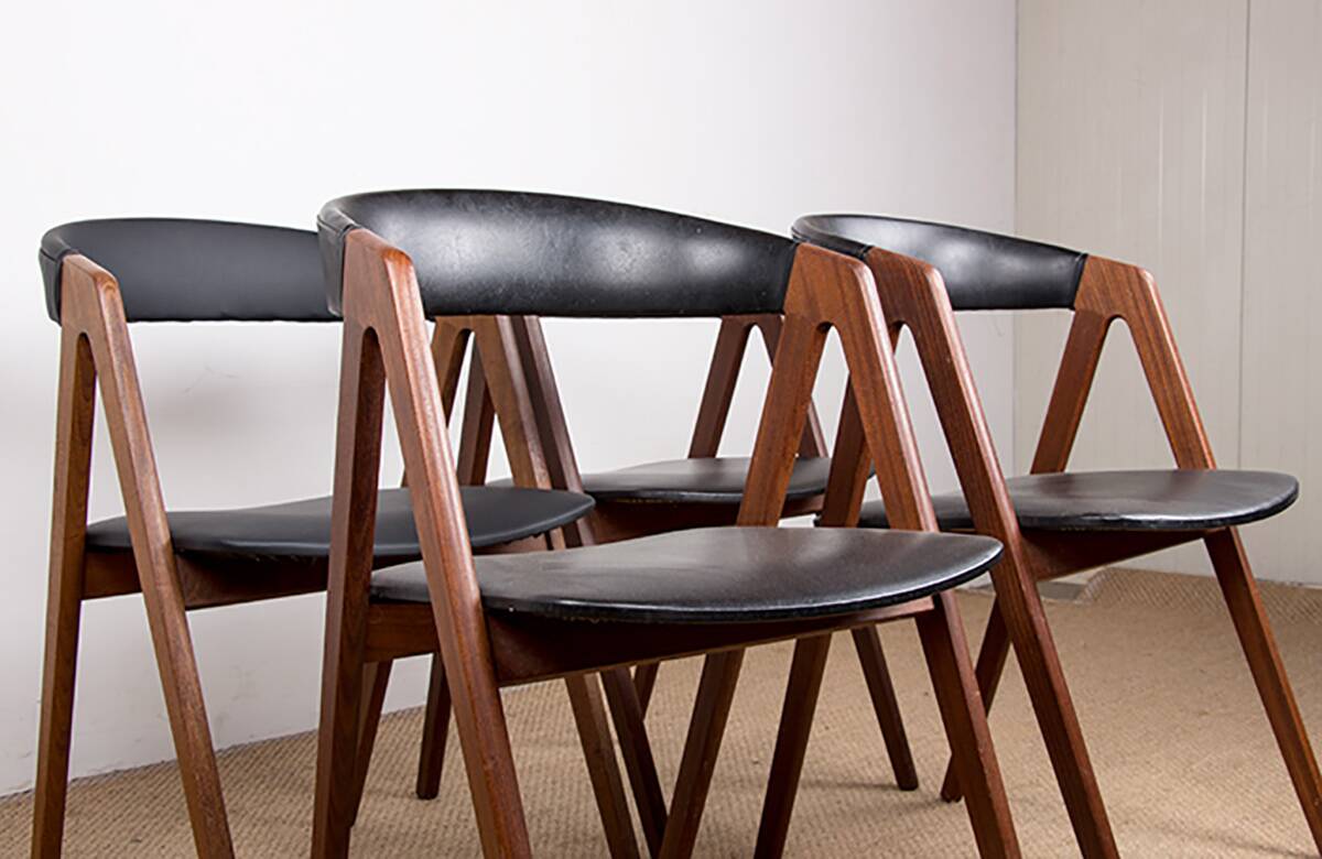 4 Danish chairs in Afromosia and skai model 205 by Thomas Harlev