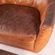 Grands fauteuil et ottoman en cuir