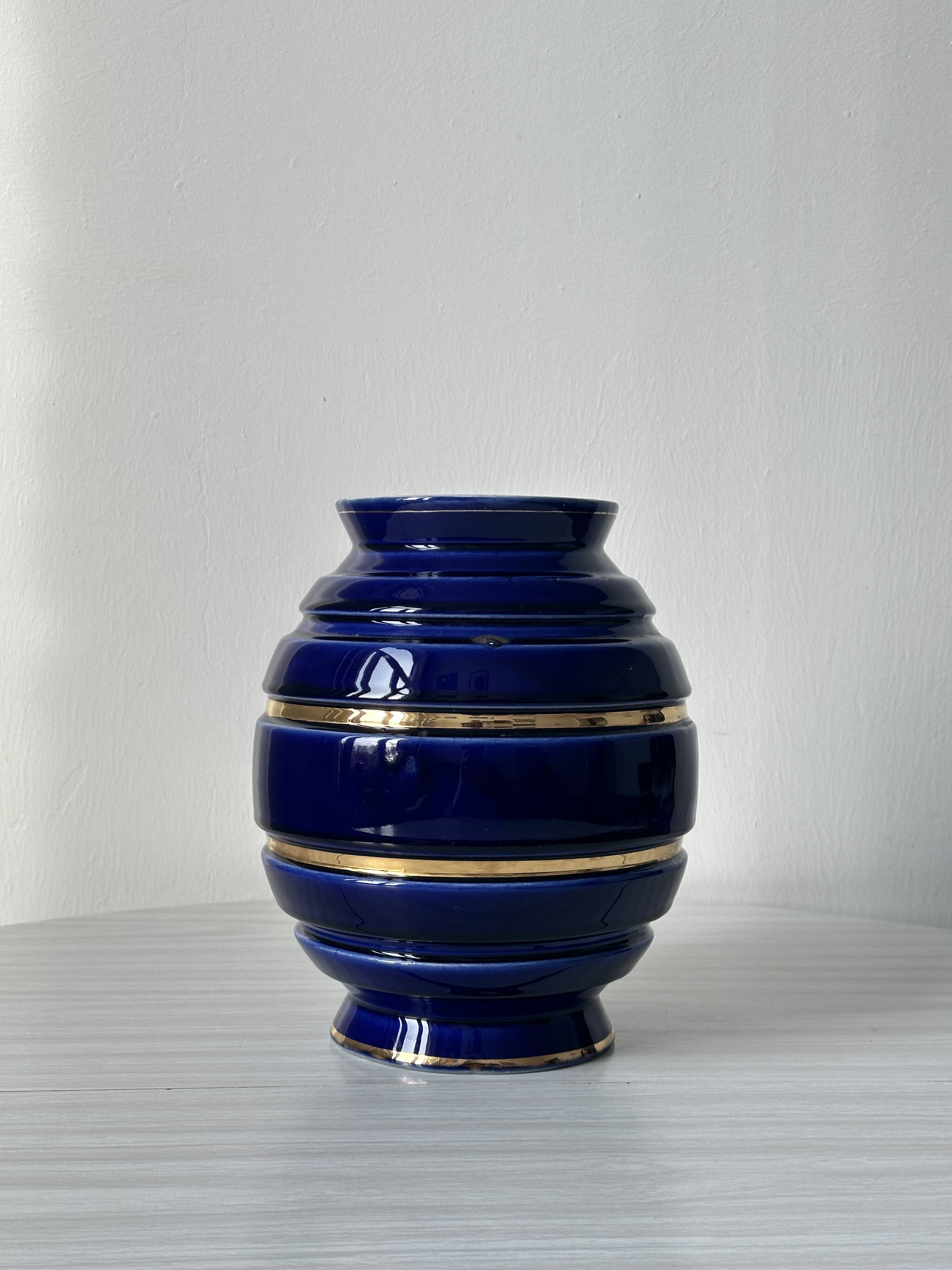Royal blue vase with gold edging