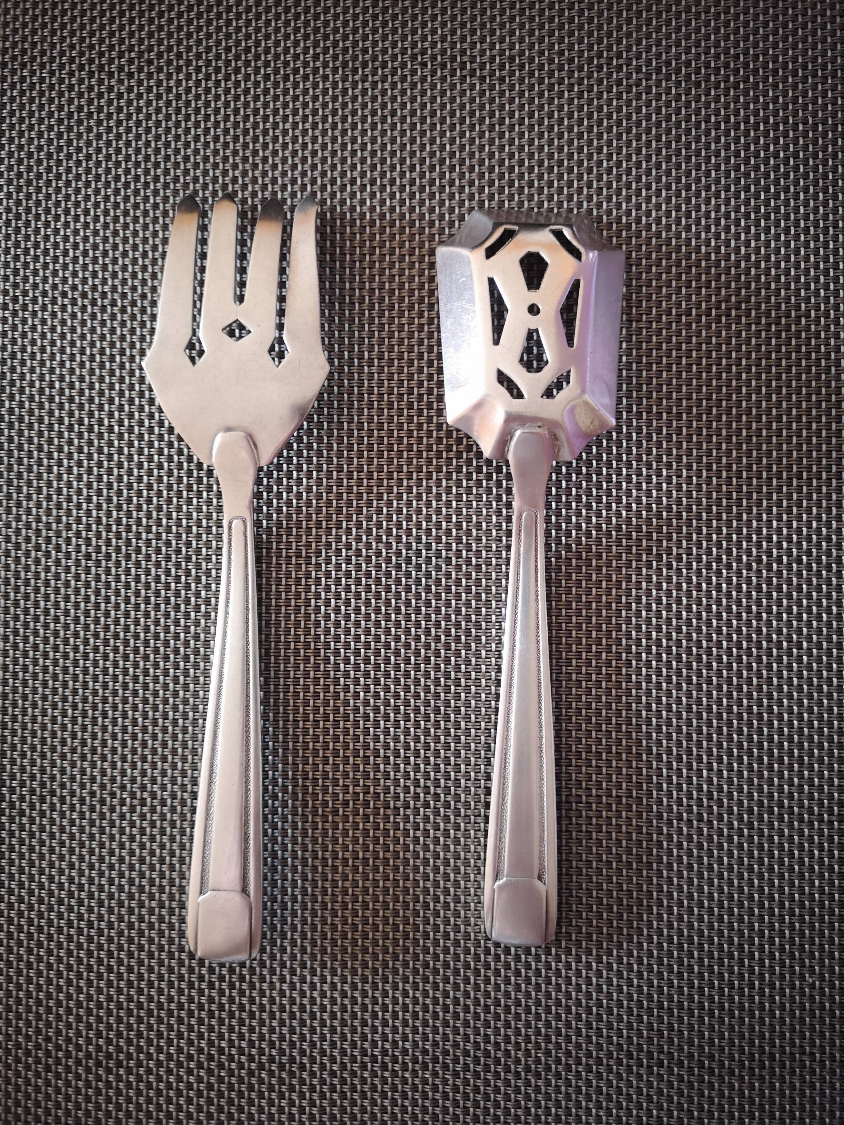 Pair of silver metal cutlery in the early 20th century