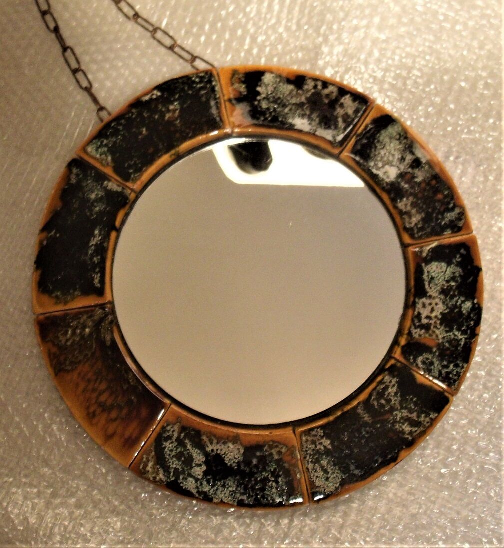 Old vintage round ceramic mirror