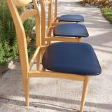 5 Scandinavian style chairs, wood and black faux leather.