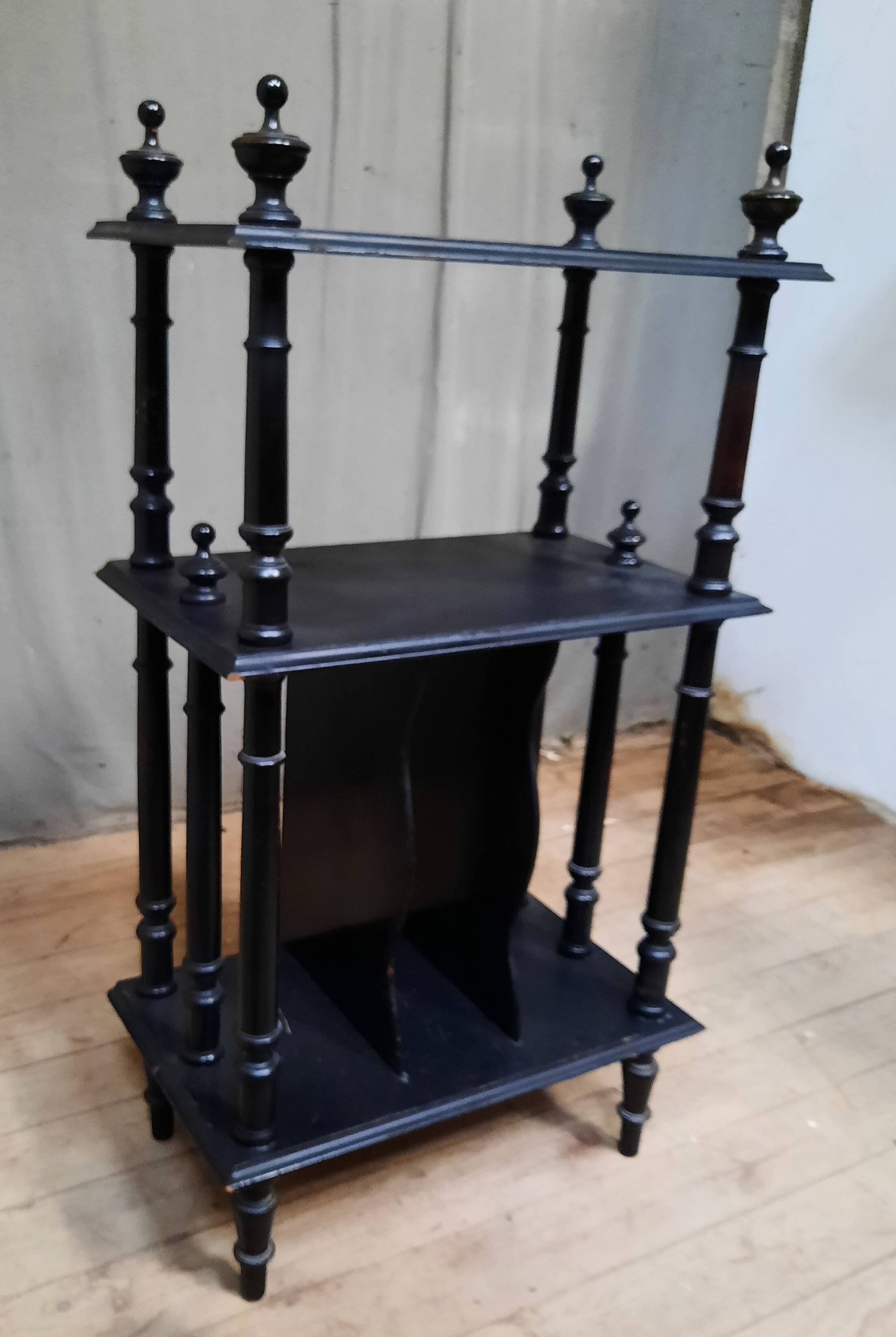 Blackened wooden shelf