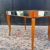 Small wooden coffee table with a mirror from the 1950s.