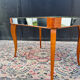 Small wooden coffee table with a mirror from the 1950s.