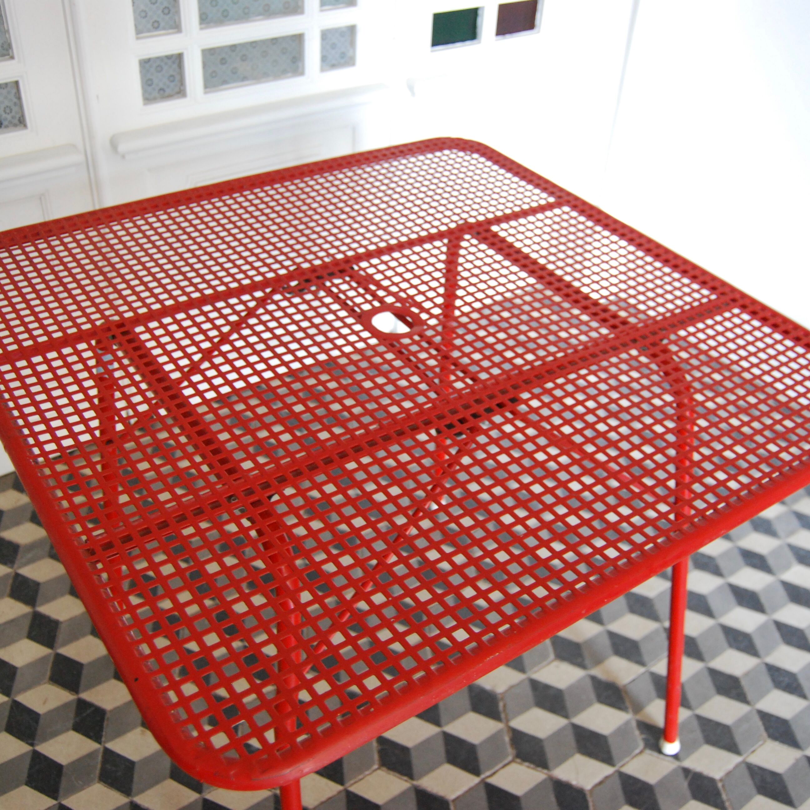 Red metal folding table Malaval type