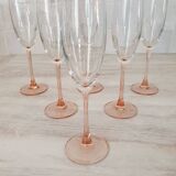 6 champagne flutes with pink stems