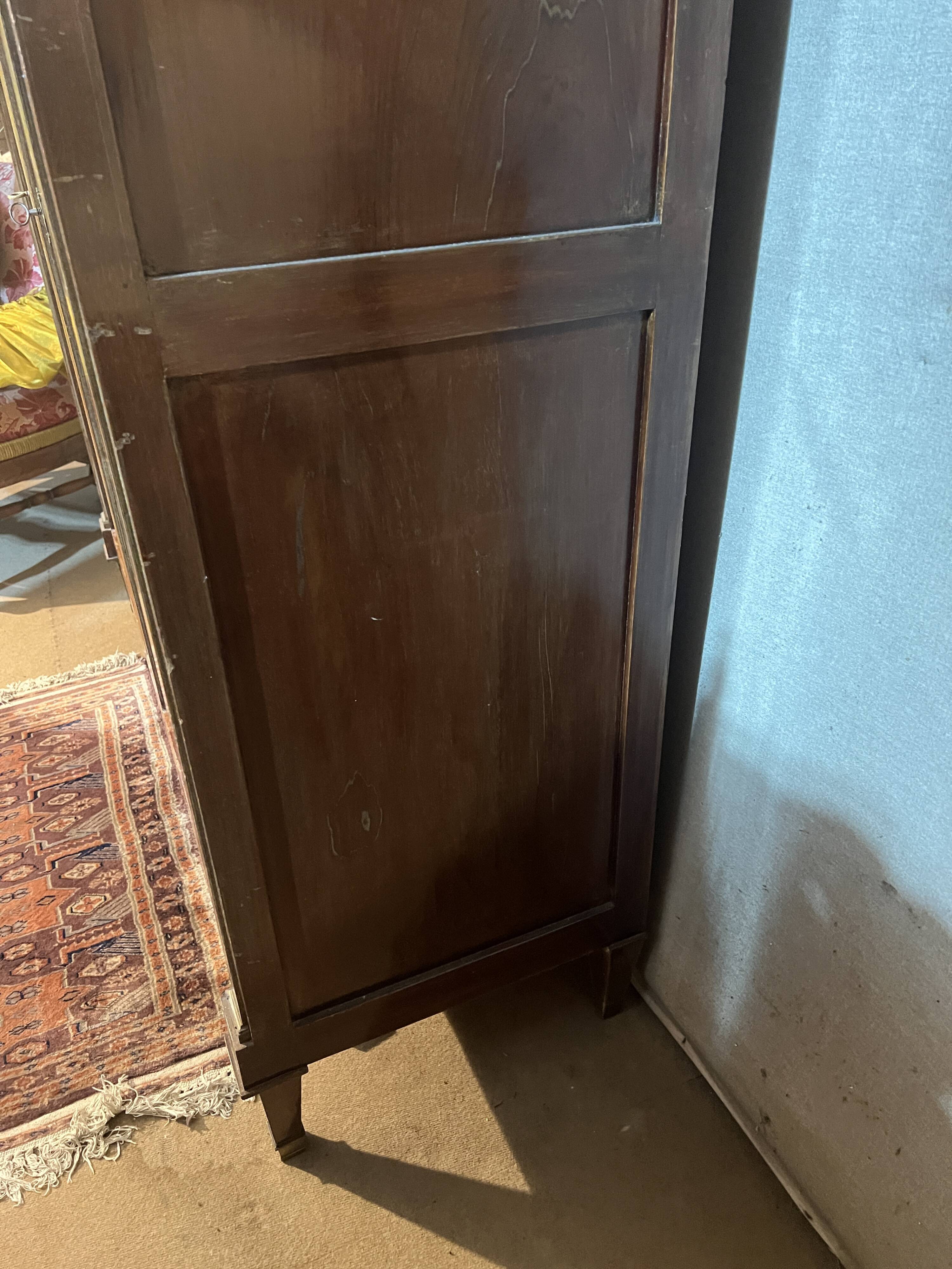 Directoire style library with two mahogany doors