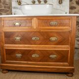 Antique washbasin cabinet from 1928 in wood and marble with a lighted mirror.