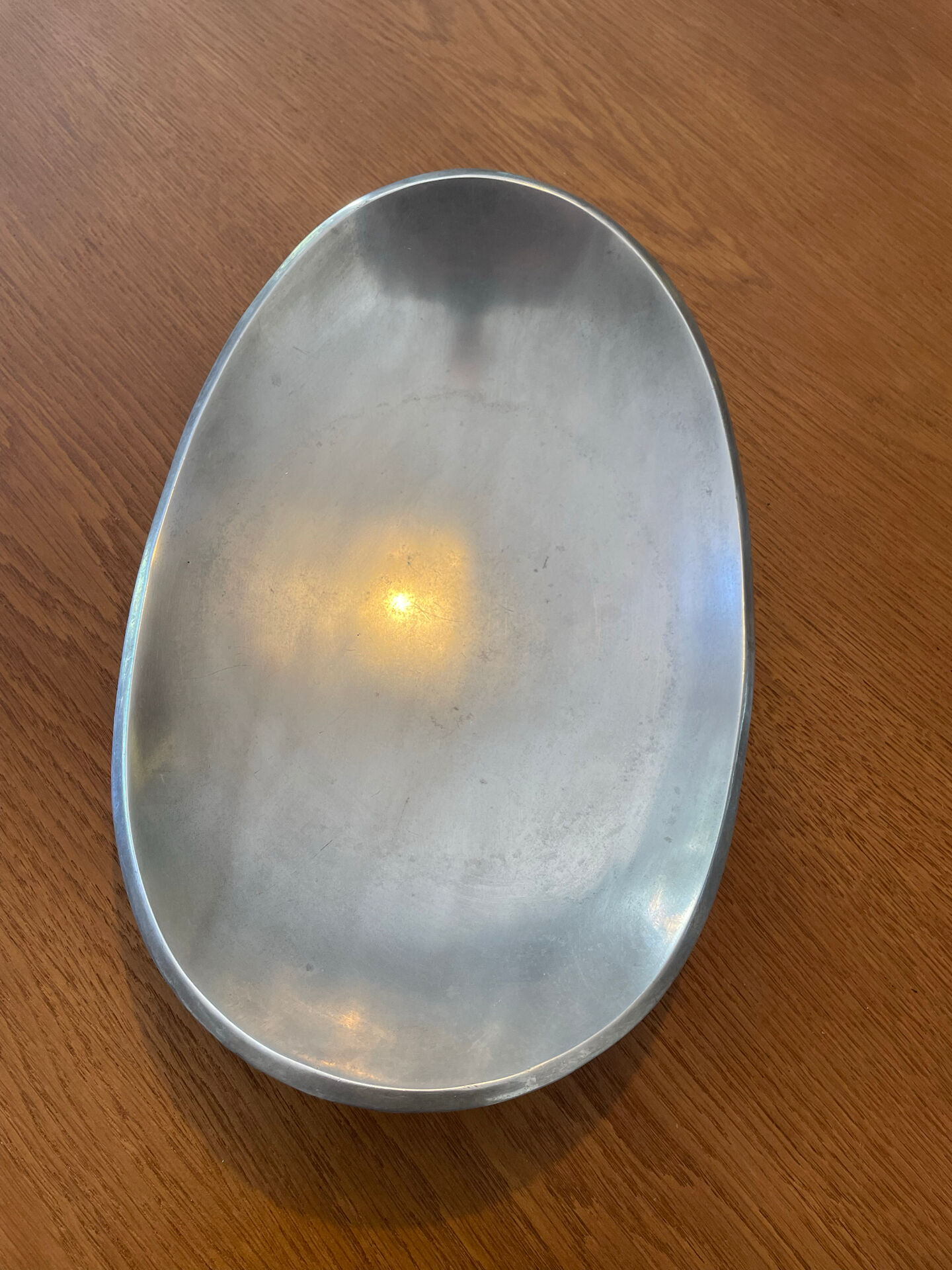 Elegant forged aluminium catchall.