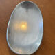 Elegant forged aluminium catchall.