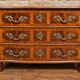 Curved commode from the Louis XIV period in marquetry - adorned with gilded bronze fittings.