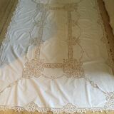 Embroidered white tablecloth and lace