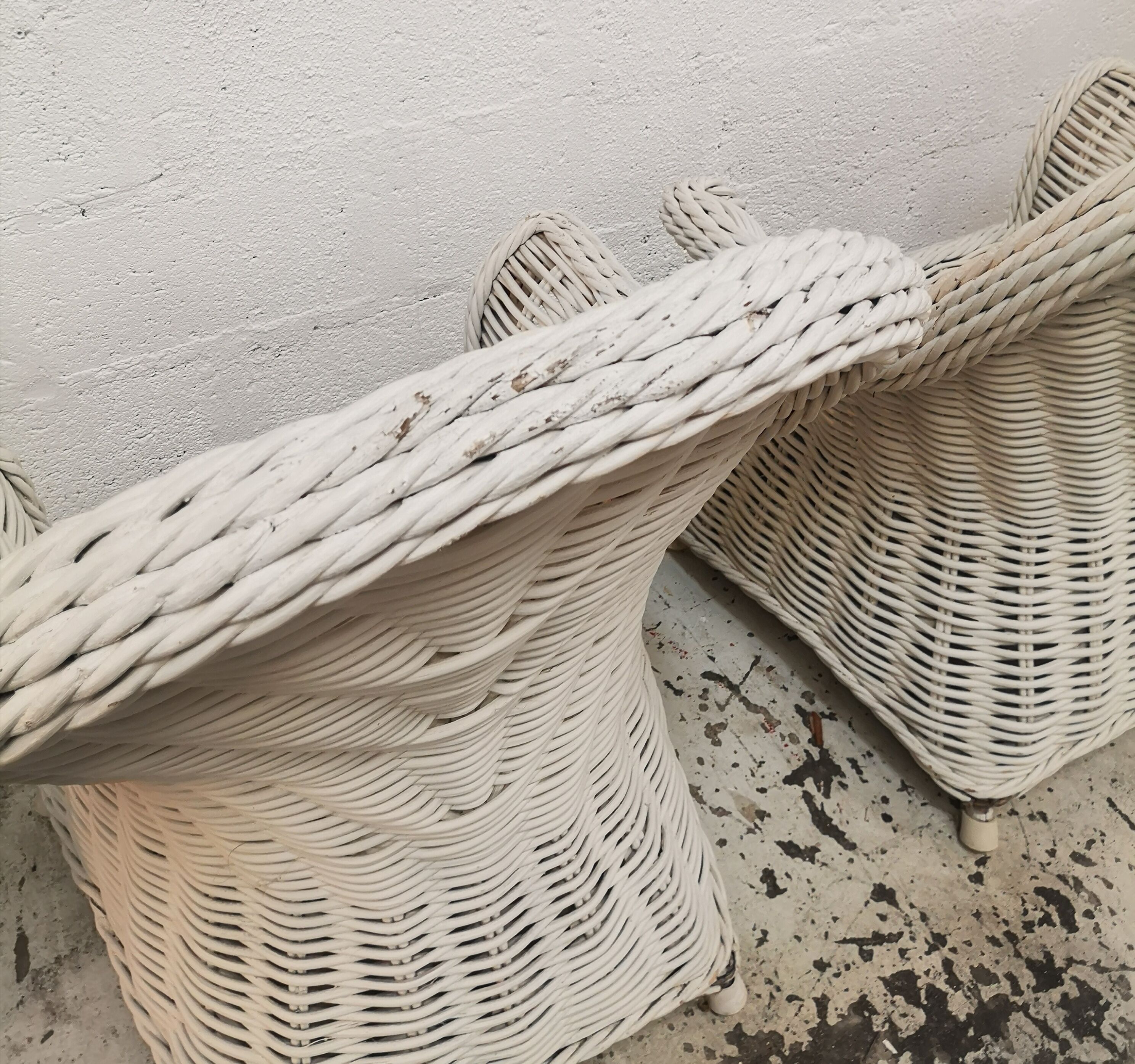 Pair of white rattan armchairs
