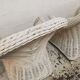 Pair of white rattan armchairs