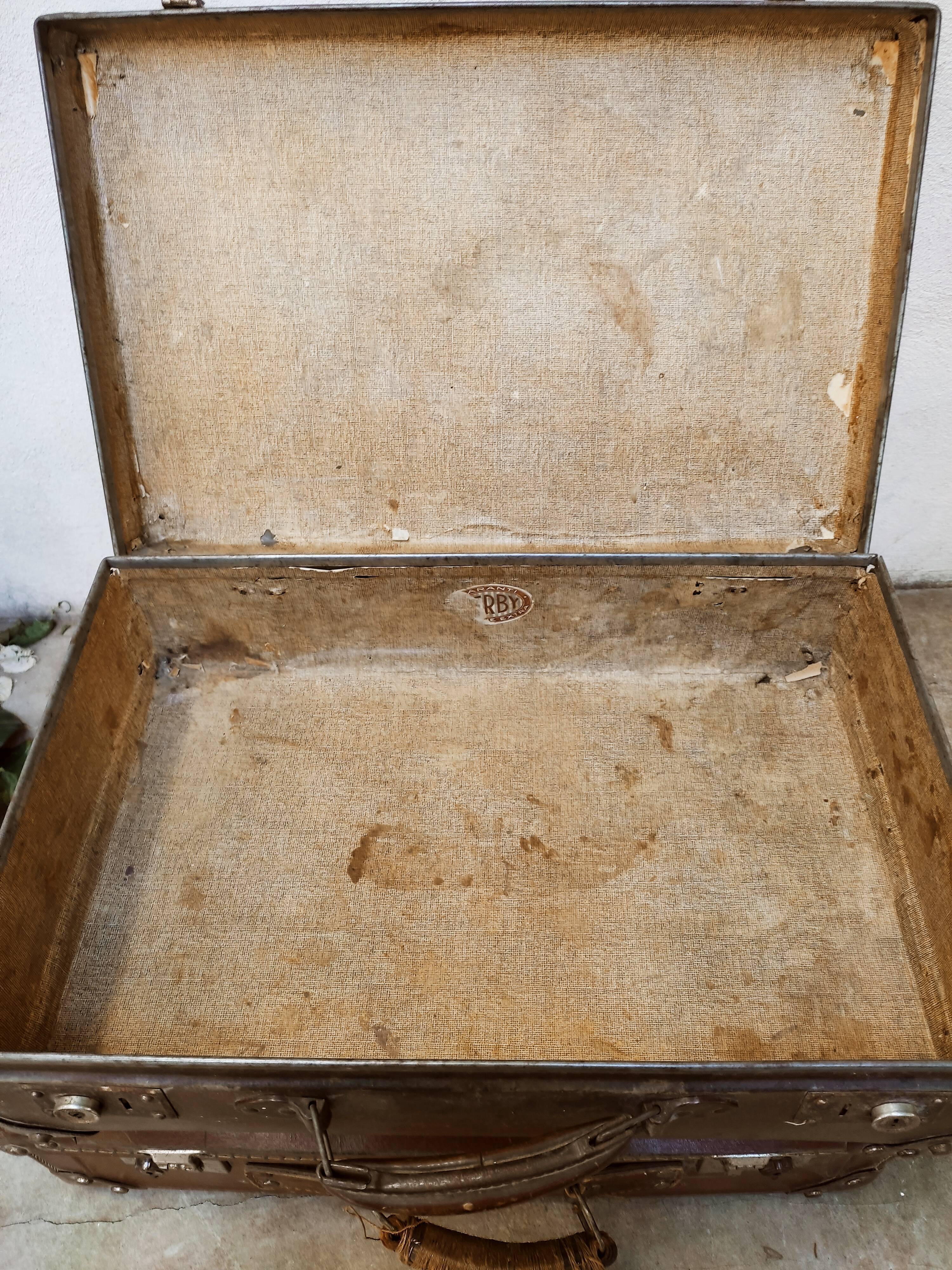 Duo of old suitcases