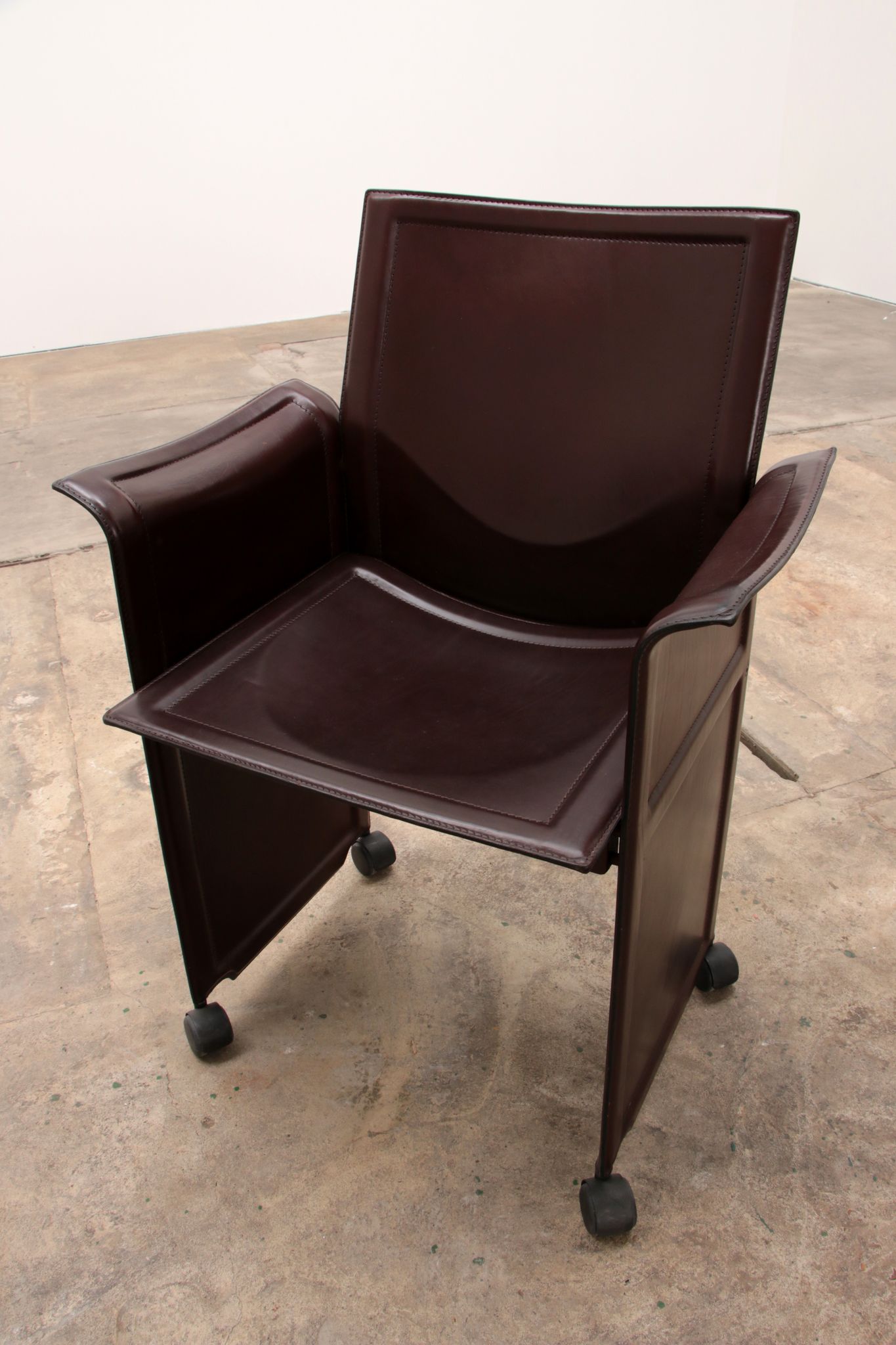 Tito Agnoli for Matteo Grassi leather dining table and six chairs