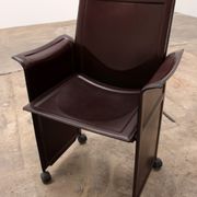 Tito Agnoli for Matteo Grassi leather dining table and six chairs