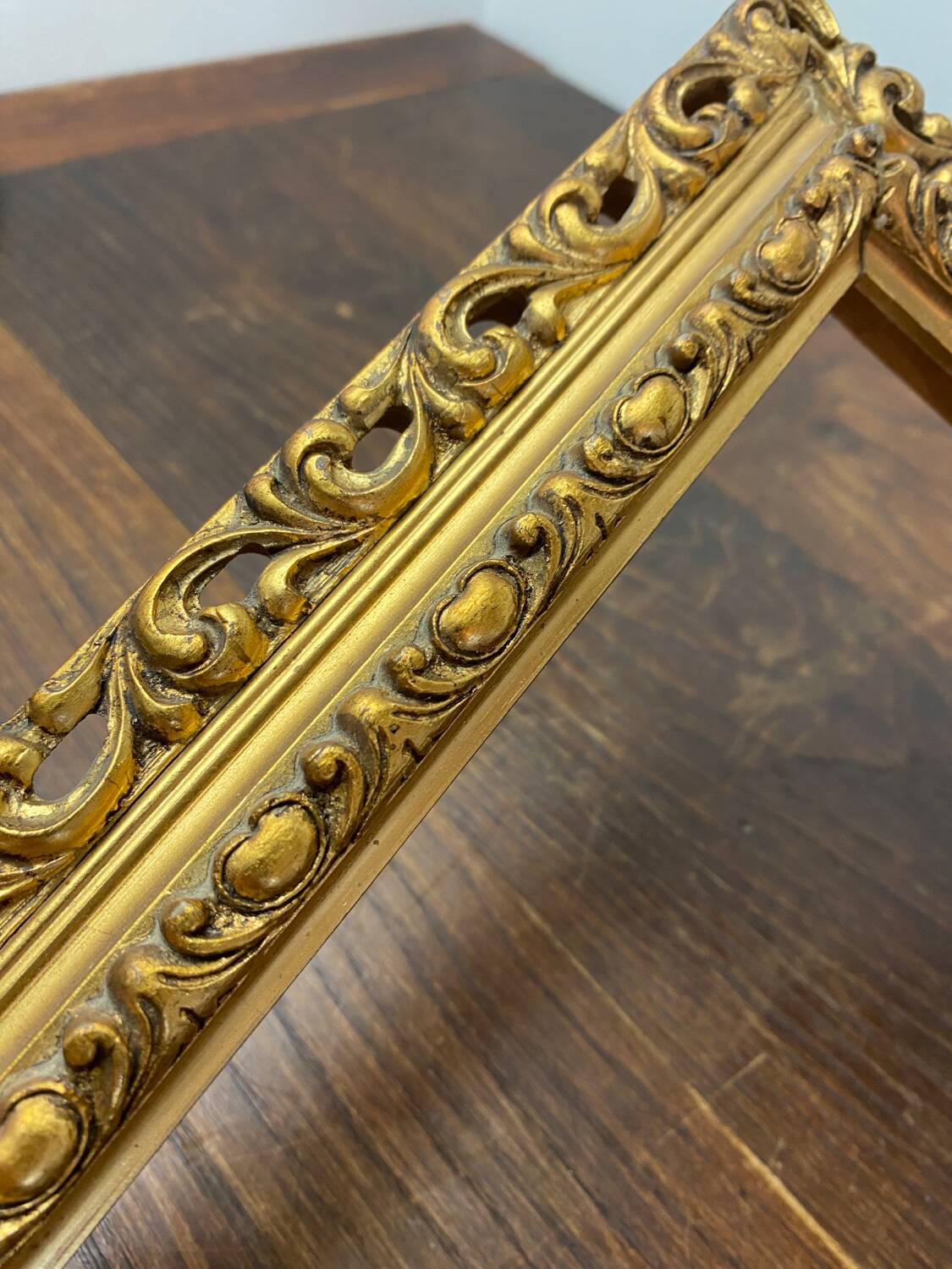 Old gilded carved wooden frame