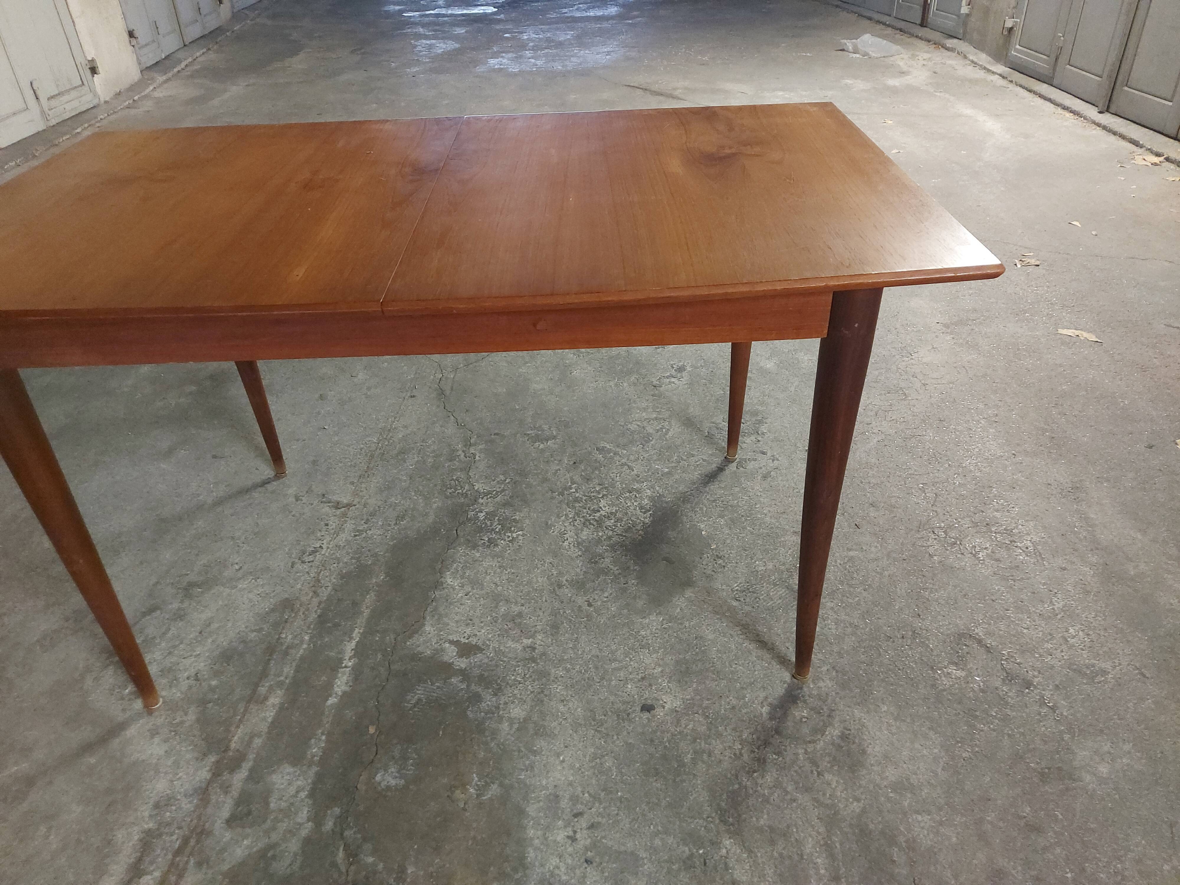 Scandinavian teak table with built-in extension