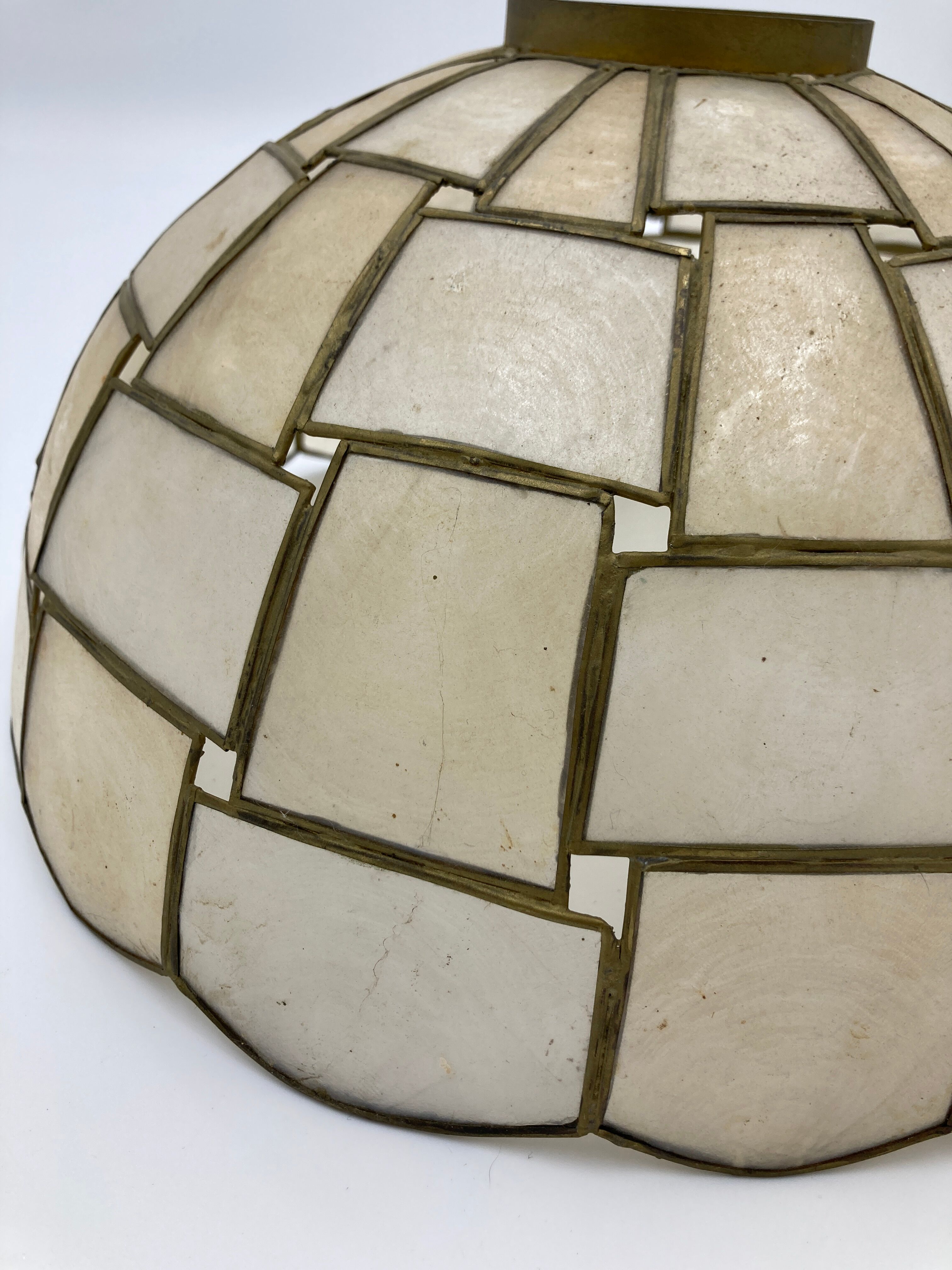 Suspension in geometric mother-of-pearl