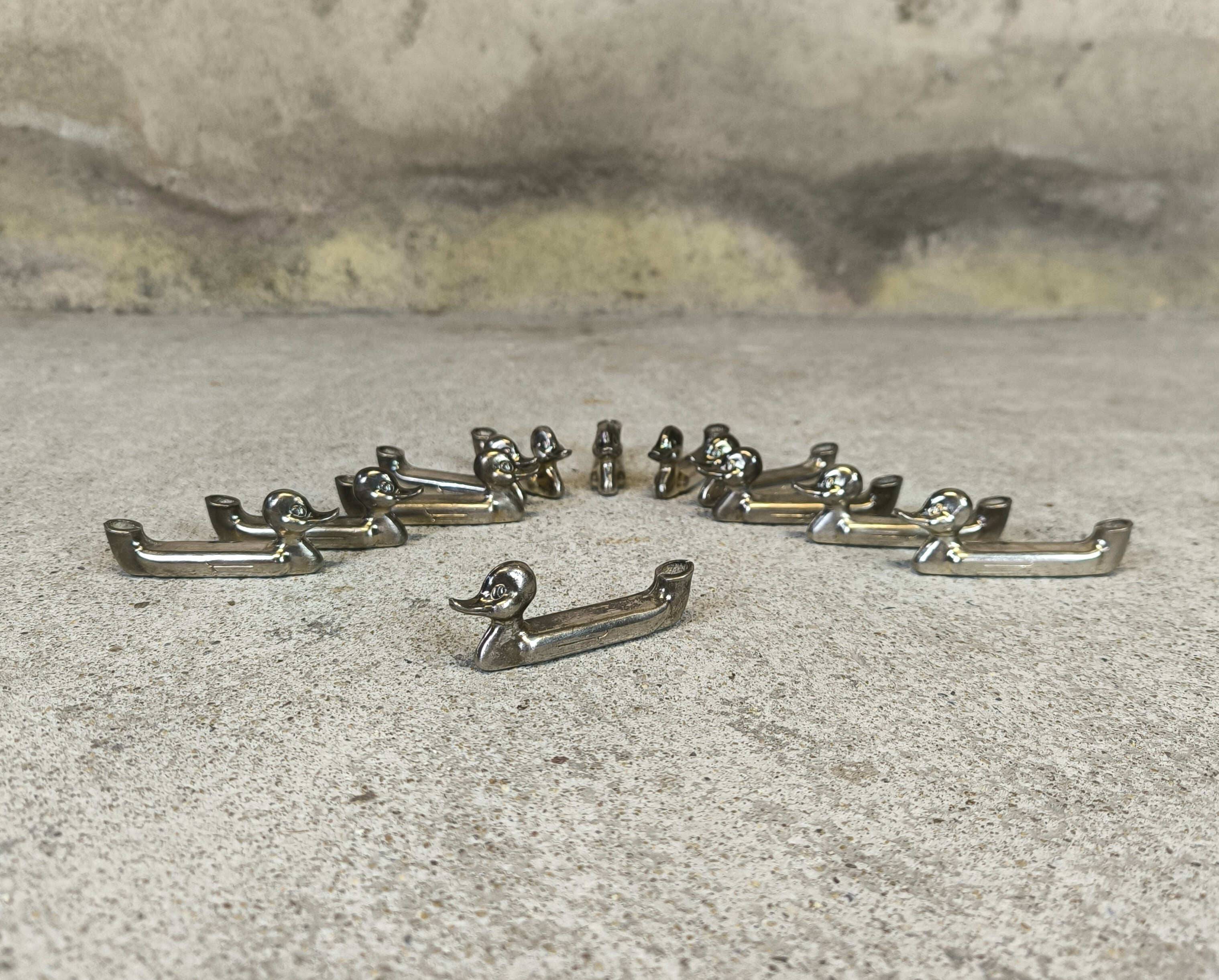 Set of 12 vintage knife rests, place card holders.