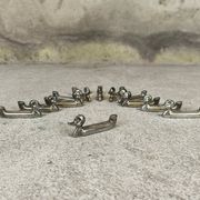 Set of 12 vintage knife rests, place card holders.