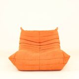 Togo sofa set and armchairs in pumpkin orange, 3 pieces, no label.