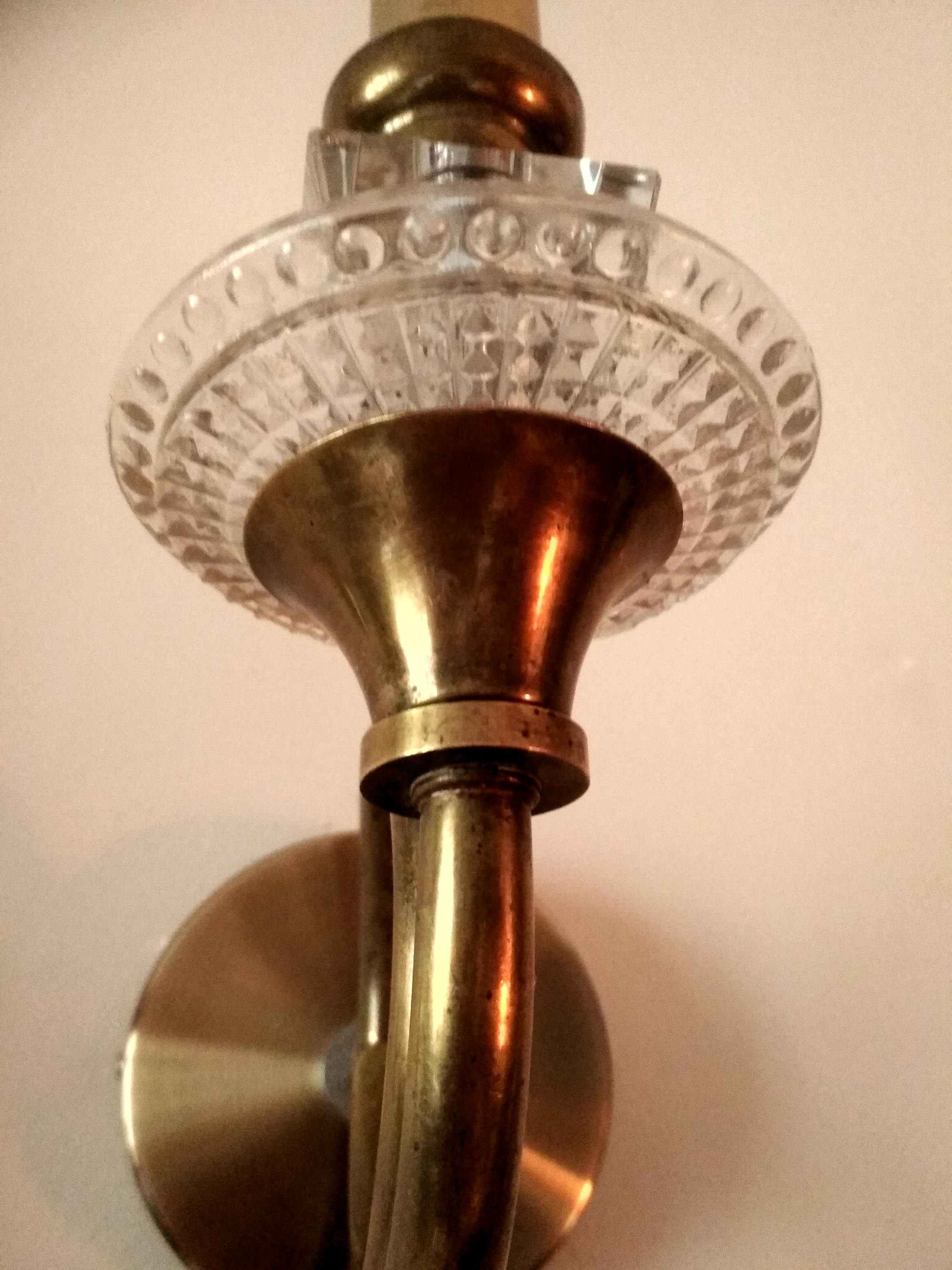Pair of old brass wall sconces