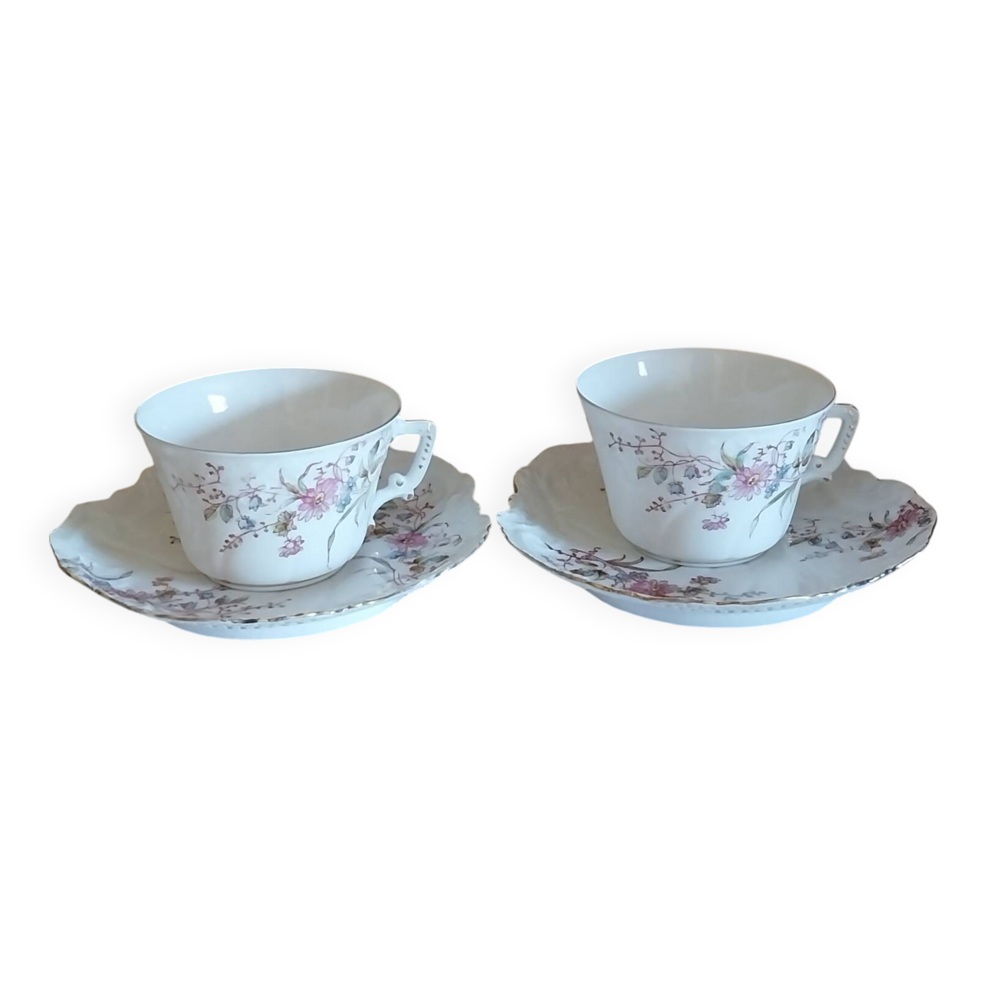 Antique art nouveau cups and saucers