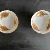 Pair of tripod bowls in gilded Limoges porcelain.