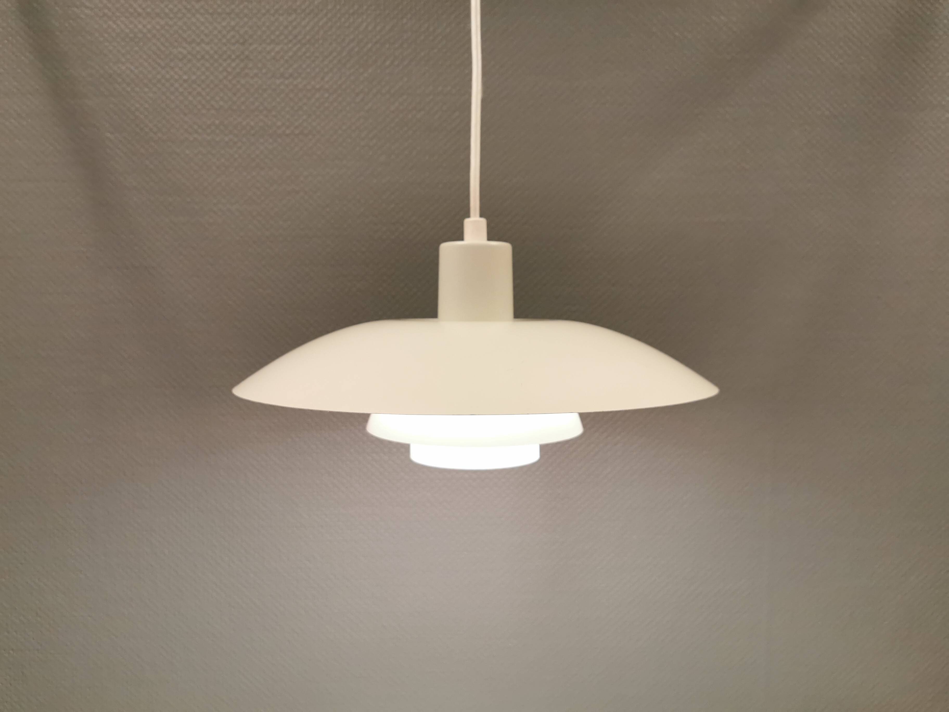 Older ph 4/3 hanging lamp, in white, with original orange dimmer.