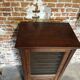 Antique printer's style wooden workshop furniture – mesh door