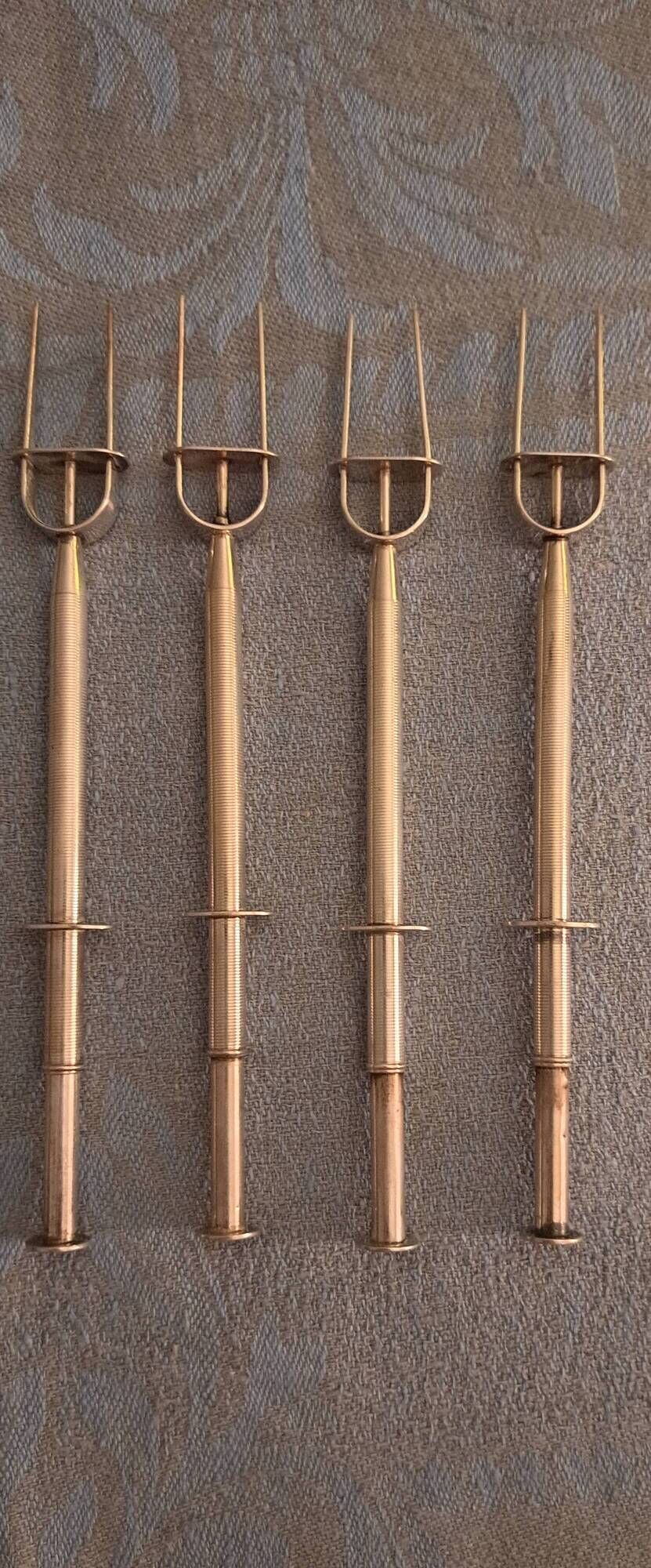 4 silver cocktail forks