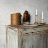 The patinated sideboard