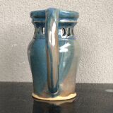 Stoneware pitcher.