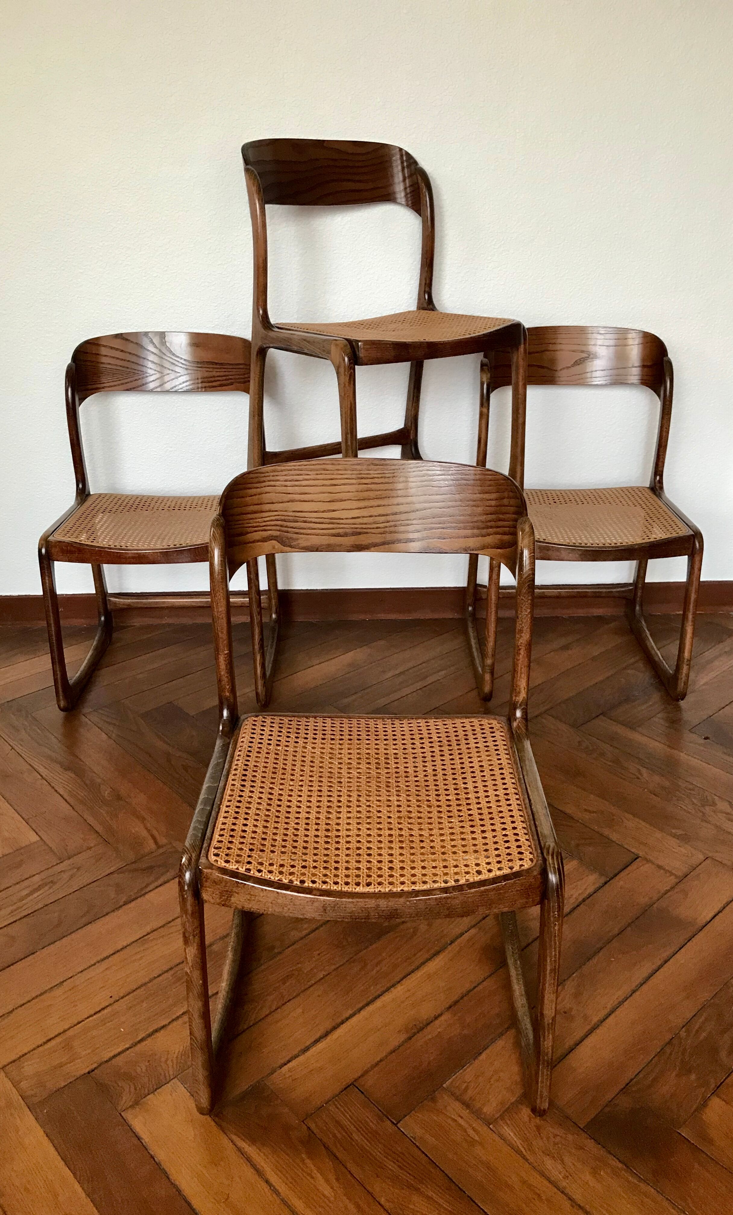 Series of 4 sleigh chairs in wicker, by Baumann