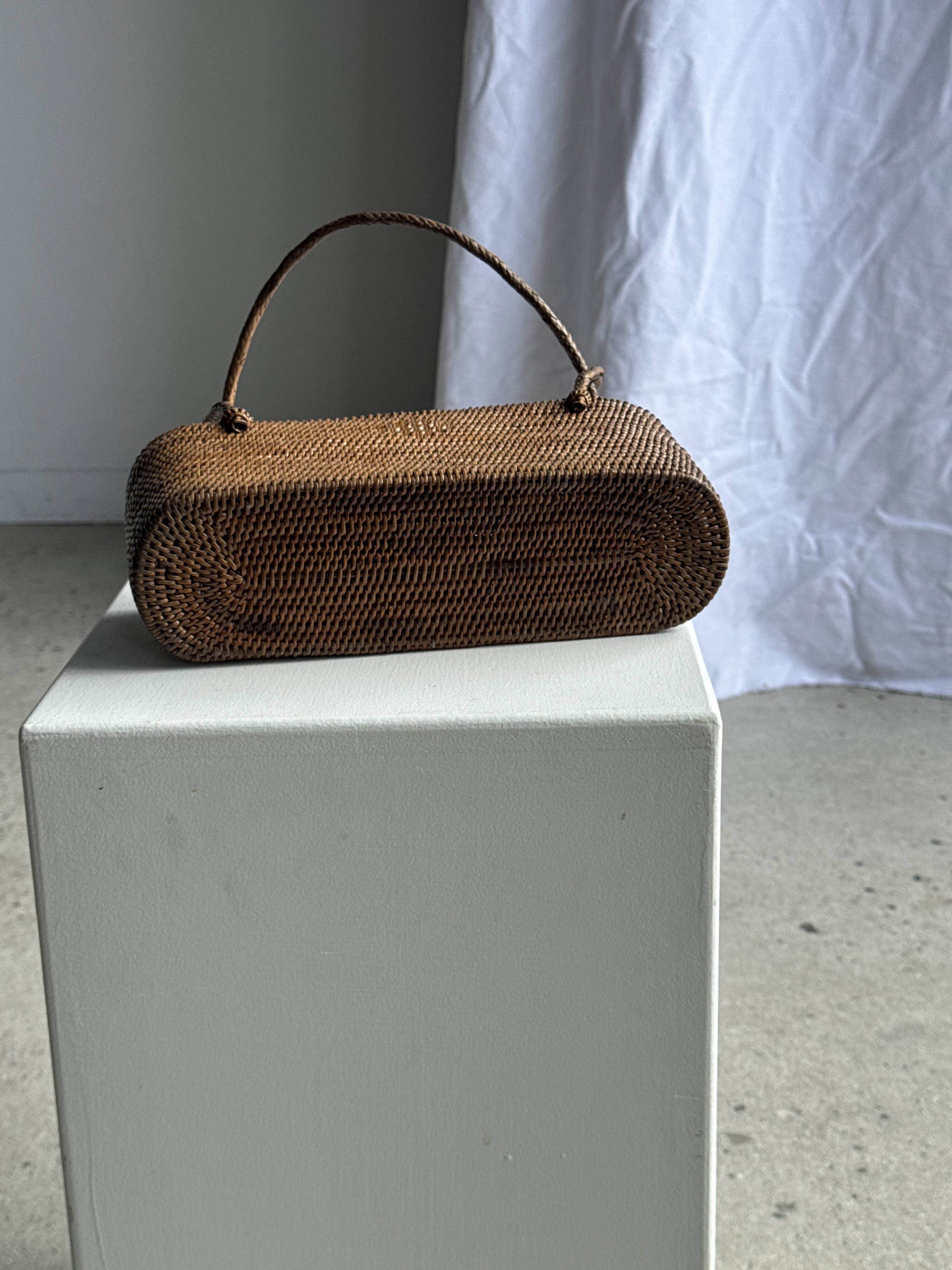 Small oval basket with long handles, traditional Indonesian L28xH10