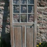 Porte vitrée en chêne brut