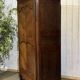 Louis XV bonnetière in cherry wood, early 19th century.